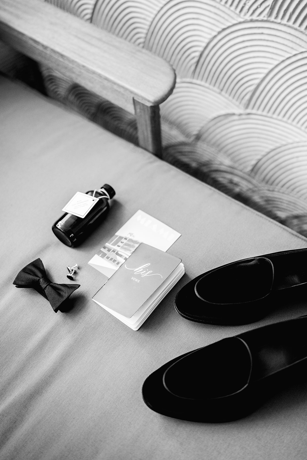 Wedding day detail photography of groom shoes, bowtie, cufflink at Mayfair House Hotel & Garden in Miami on wedding day.