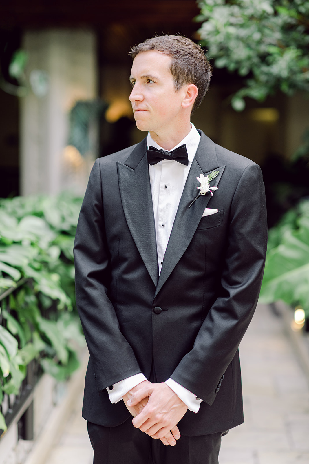 Groom before first look at Mayfair House Hotel & Garden in Miami on wedding day.