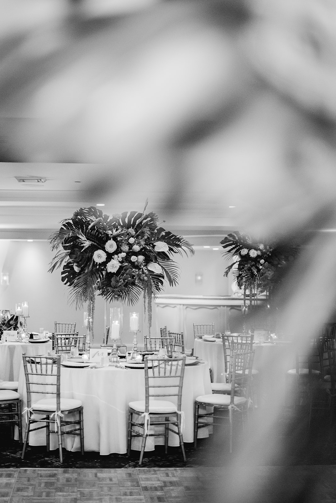 Black and white shot of decor for reception at Mayfair House Hotel & Garden in Miami on wedding day.