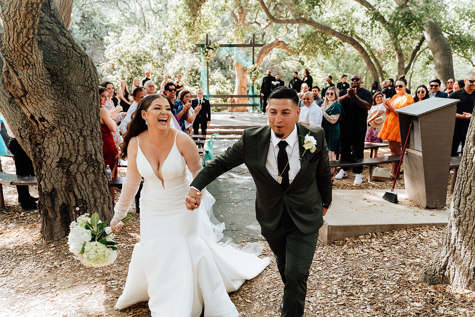 Bride and groom celebrating their marriage at the Oak Canyon Nature Center Orange County California