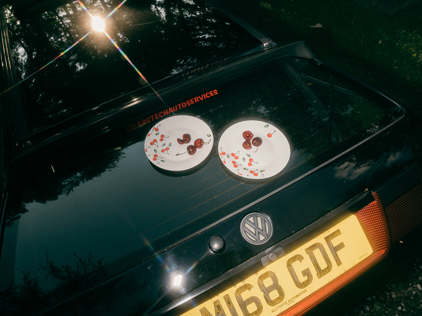 Cherries on cherry plates on a mk3 gti boot lid