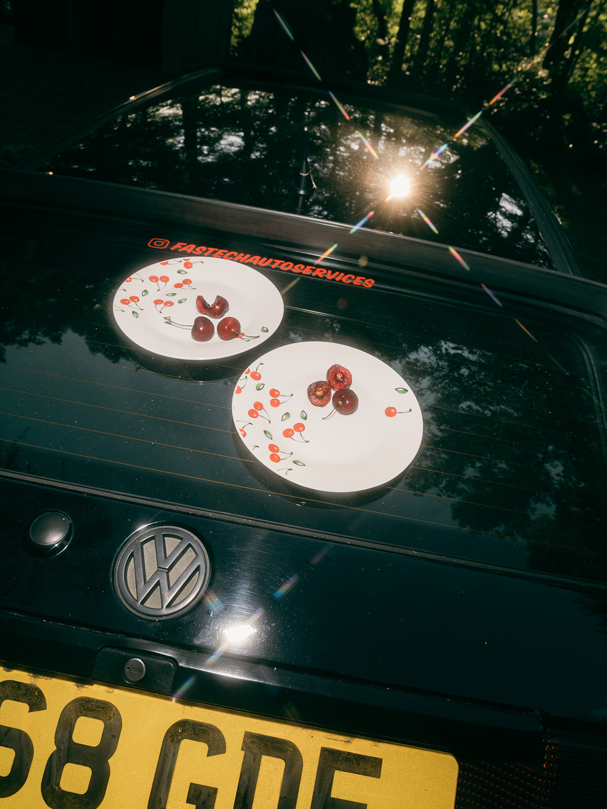 Cherries on cherry plates on a mk3 GTI trunk lid