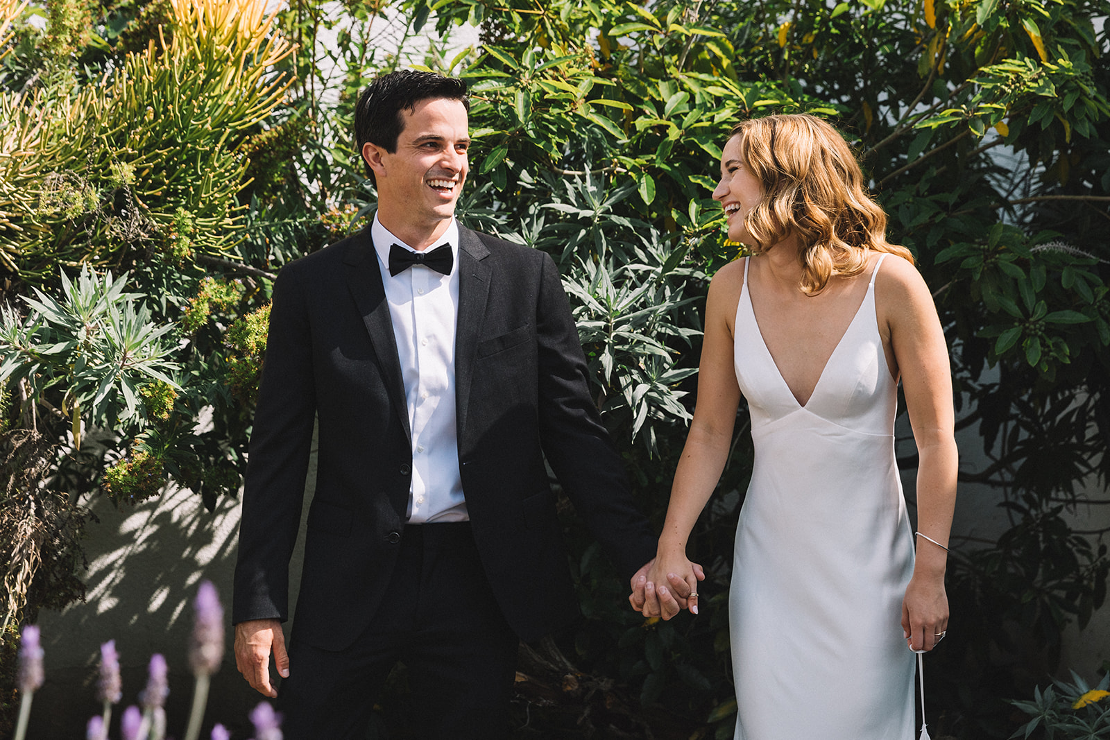 A classic black suit and simple wedding dress was the perfect casual Orange County, California beach wedding. 