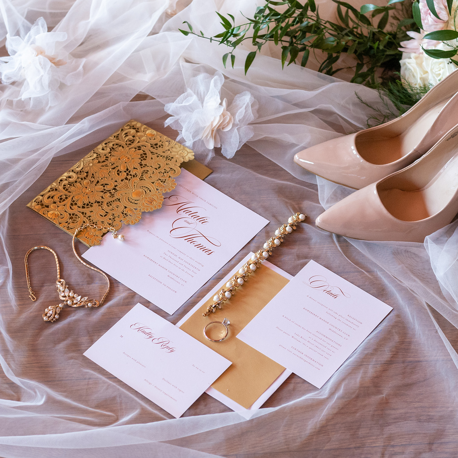 Details of shoes, wedding invitation, jewelry, bracelet, ring, diamond, and veil