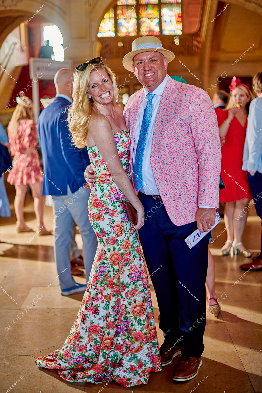 Event guests in the Hall of Ochre Court Mansion in Newport, RI at Star Kids' Kentucky Derby Gala captured by Cocoa & Co 