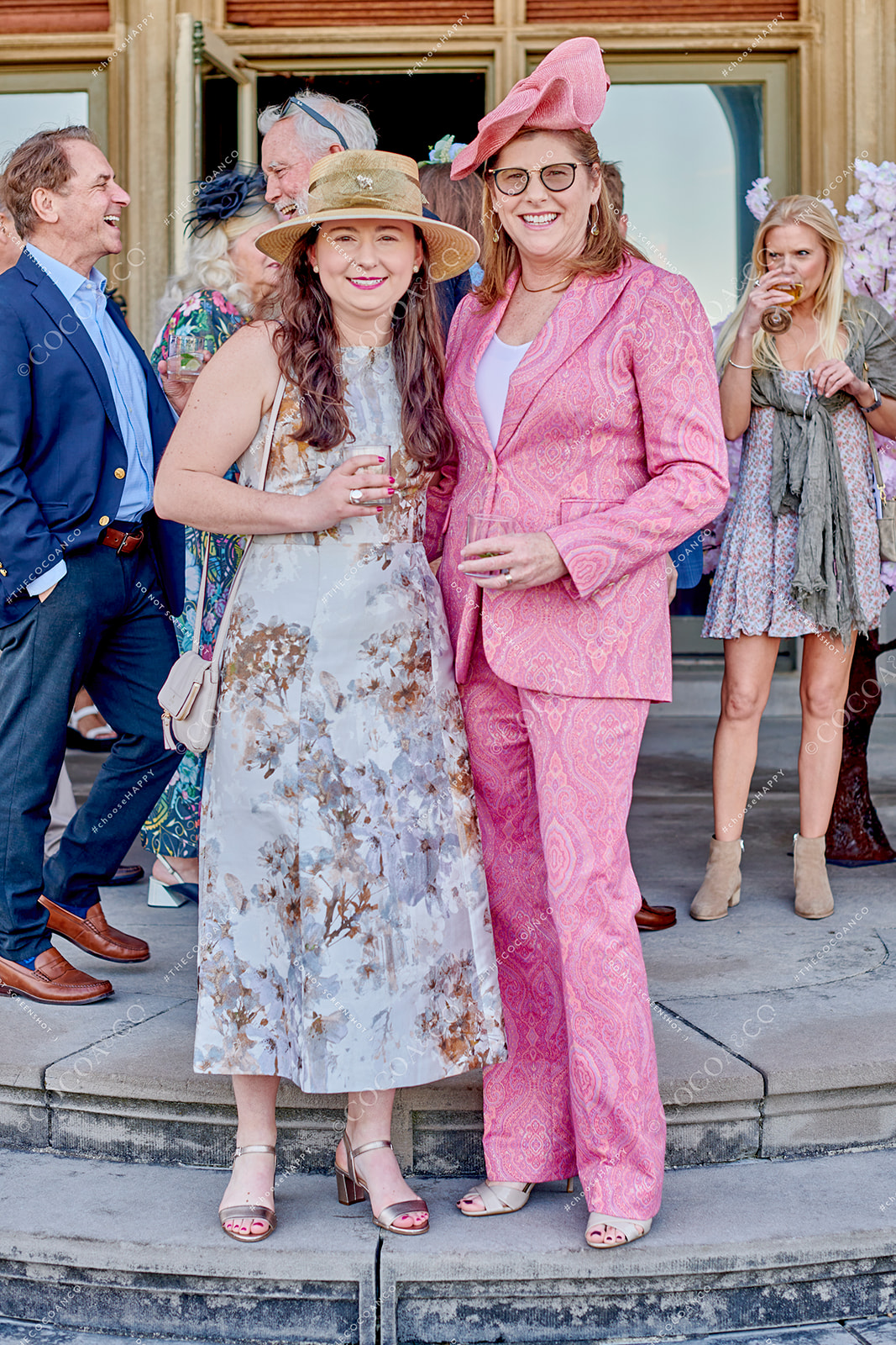 Guests on terrace at Ochre Court Mansion - Newport, RI at Star Kids' 2023 Kentucky Derby Gala captured by Cocoa & Co 