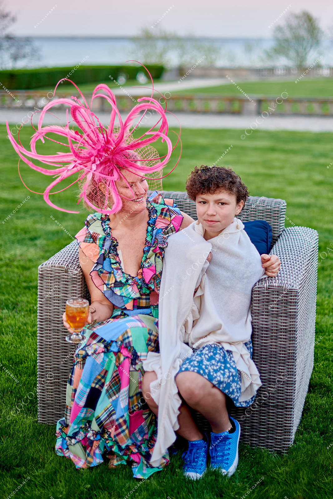 Event guests on the lawn of Ochre Court Mansion in Newport, RI at Star Kids' Kentucky Derby Gala captured by Cocoa & Co 