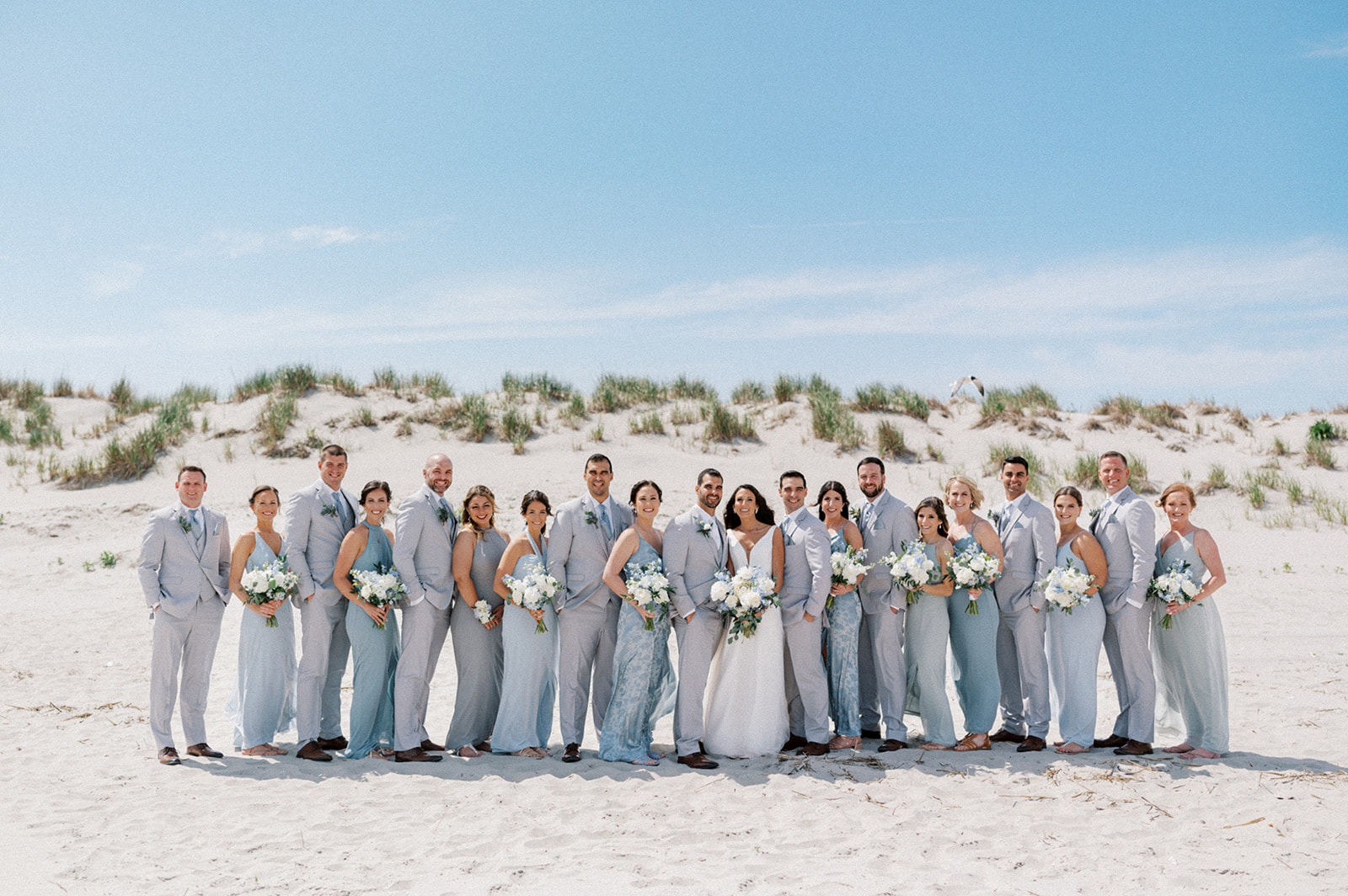 Bridal party beach portraits at Icona Avalon Wedding