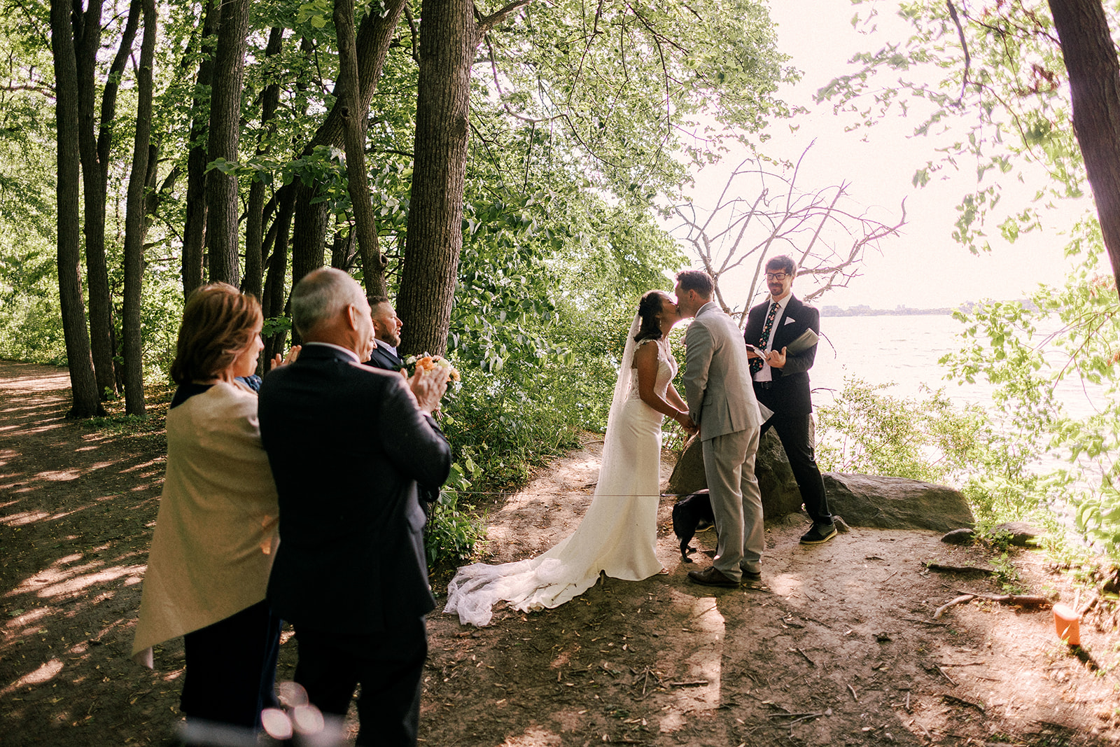 bride and groom have their ceremony at picnic point in madison wisconsin