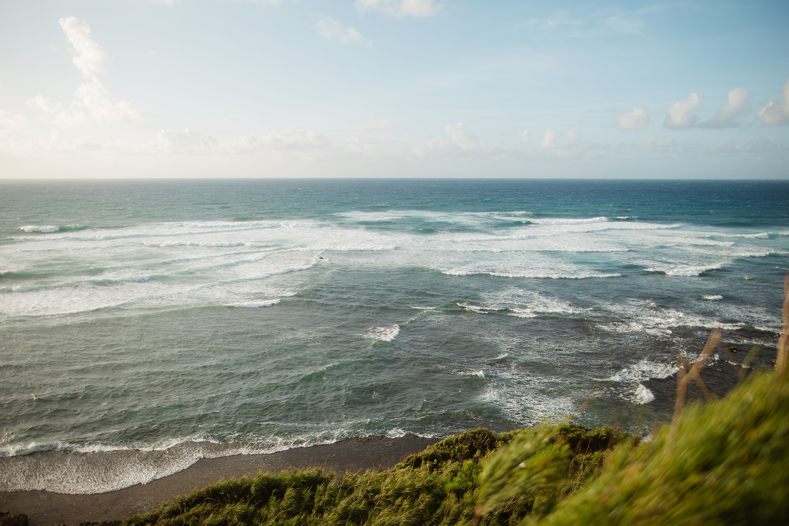 Kauai Shipwrecks beach cliff elopement