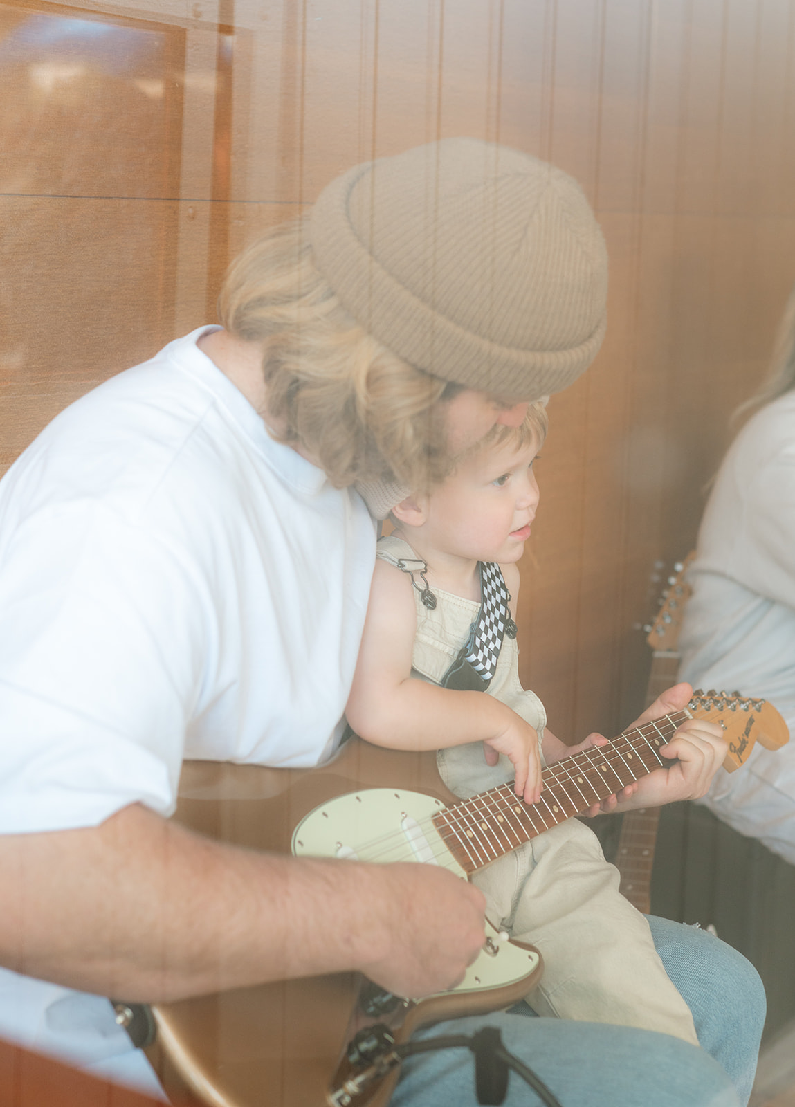 Family play music together in home at Provo Utah