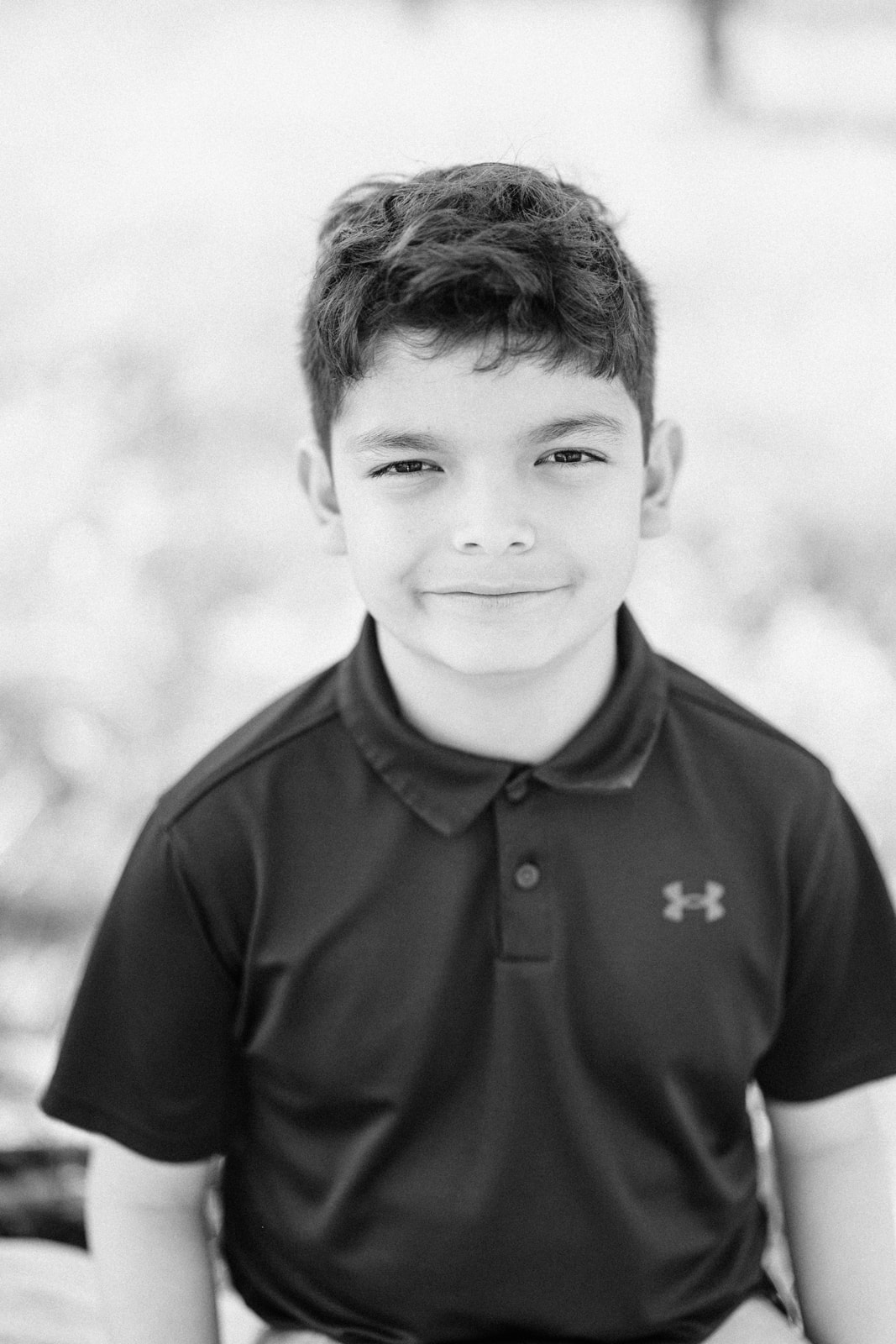 Portrait of elementary school boy in black and white
