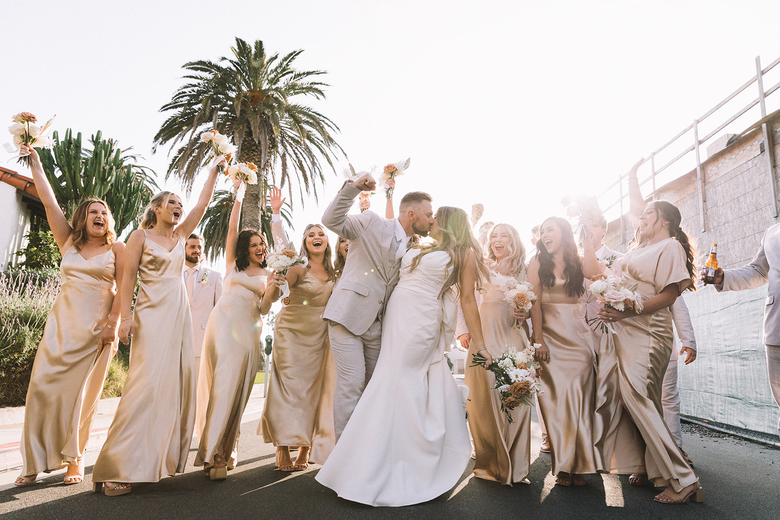 Untraditional, unstuffy, bridal party portraits at this beach wedding at the Orange County wedding venue. 