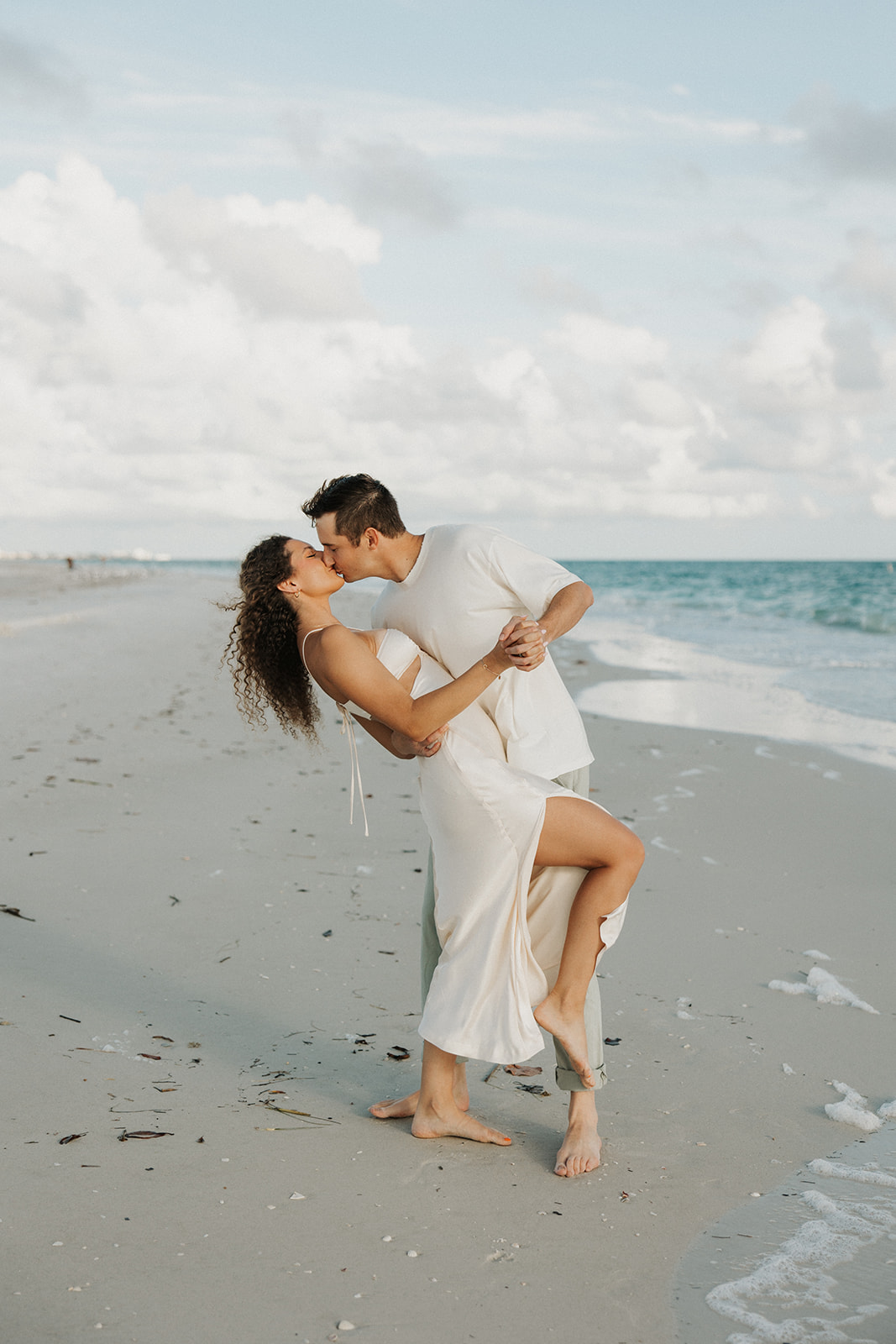 Dreamy and candid Longboat Key Florida engagement photos. 