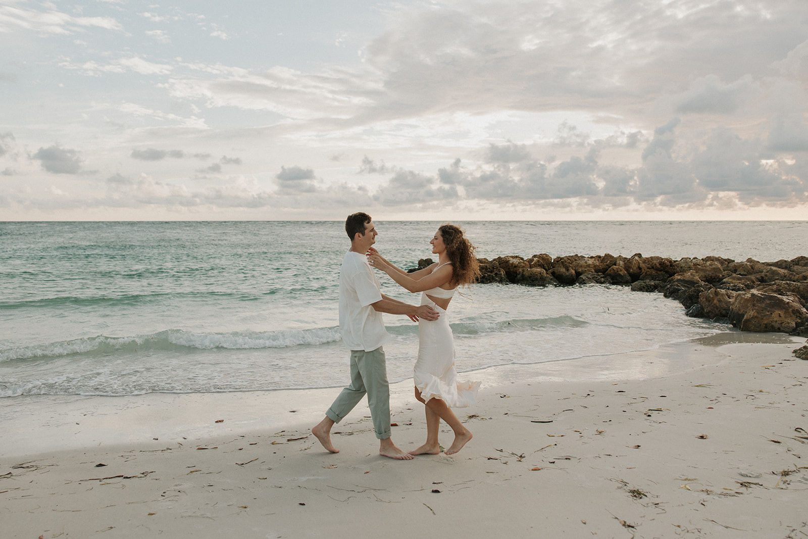 Dreamy and candid Longboat Key Florida engagement photos.