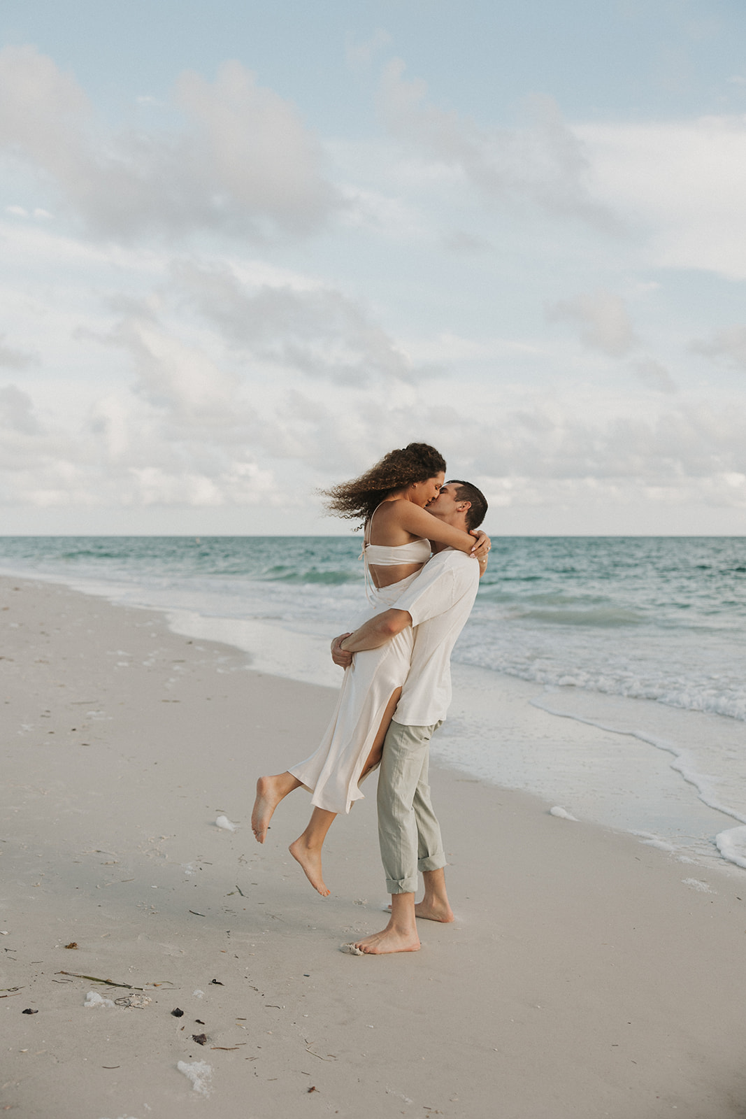 Dreamy and candid Longboat Key Florida engagement photos.. 