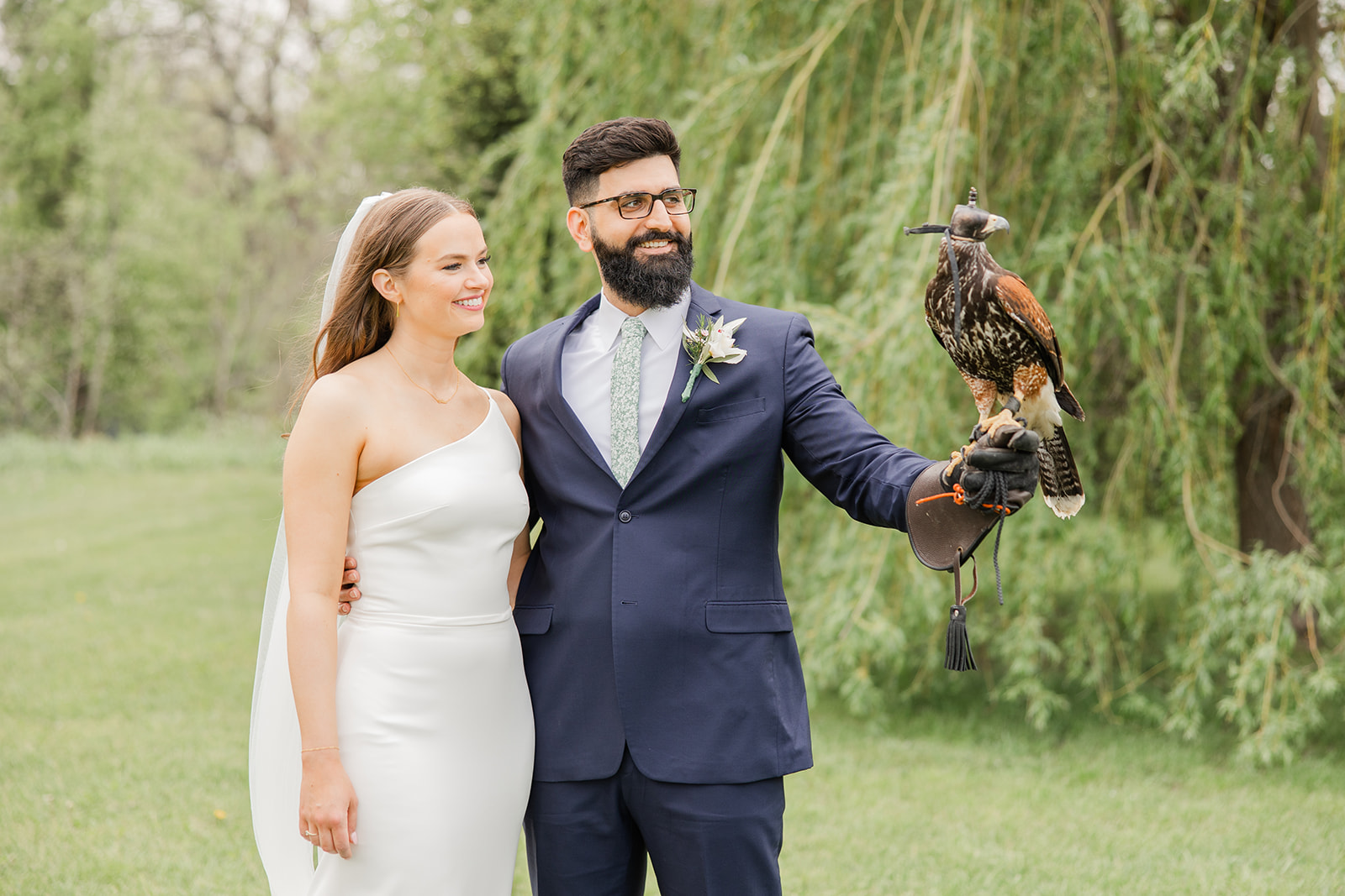 Iowa City Wilson's Ciderhouse Wedding bride and groom portrait bird of prey