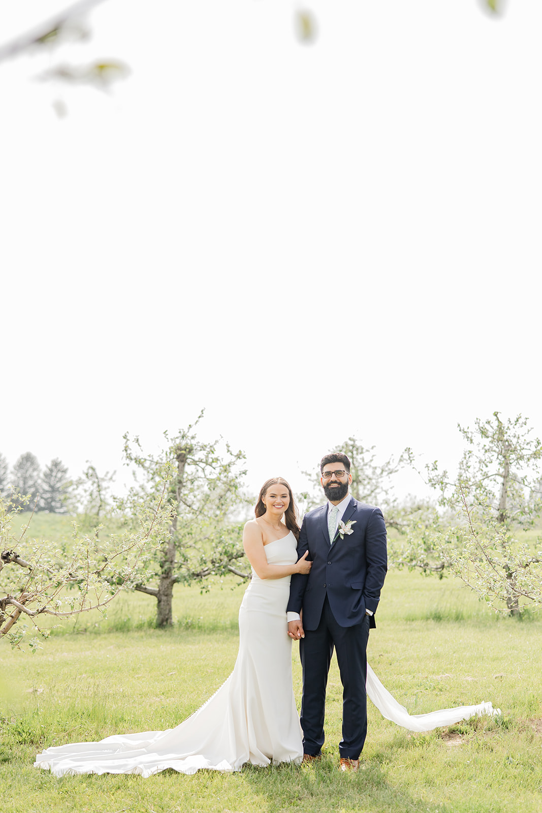 Iowa City Wilson's Ciderhouse Wedding bride and groom portrait orchard