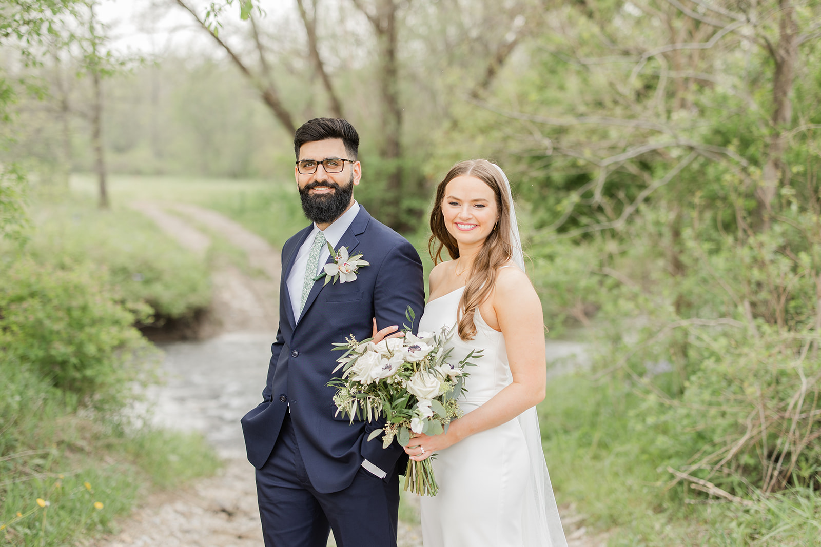 Iowa City Wilson's Ciderhouse Wedding bride and groom portrait river