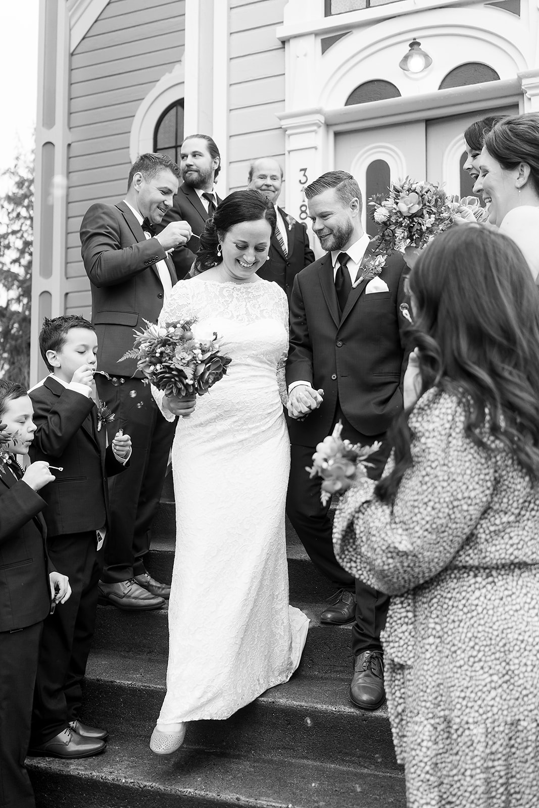 wedding ceremony recessional out of st. johns church in port gamble 
