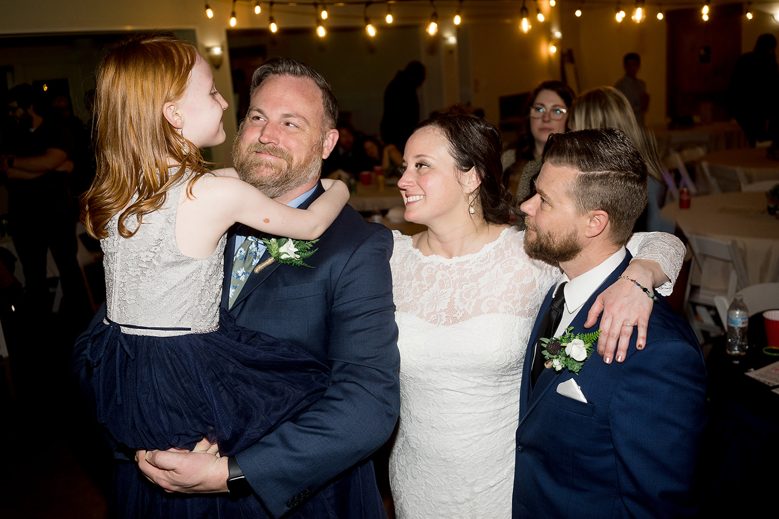 family together at port gamble wedding reception