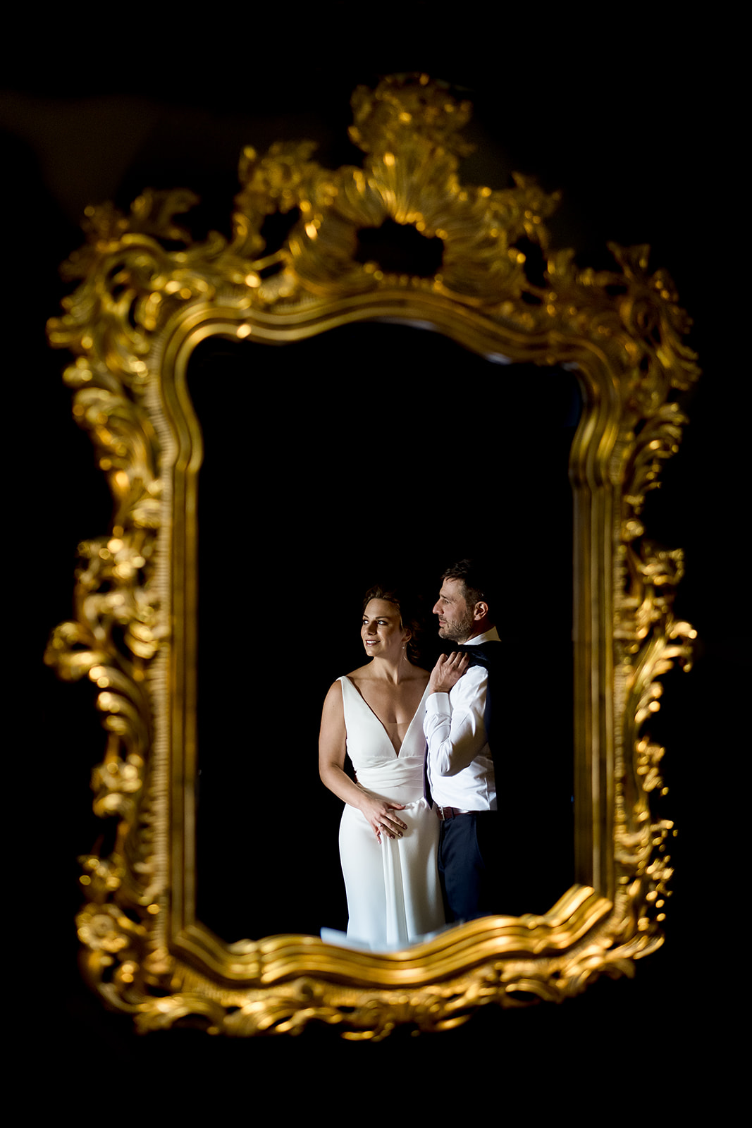 bride and groom portrait frames in gold frame at hotel Ballard