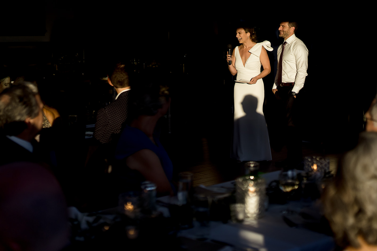 bride and groom give toast at Hotel Ballard Olympic Rooftop Pavilion Wedding reception