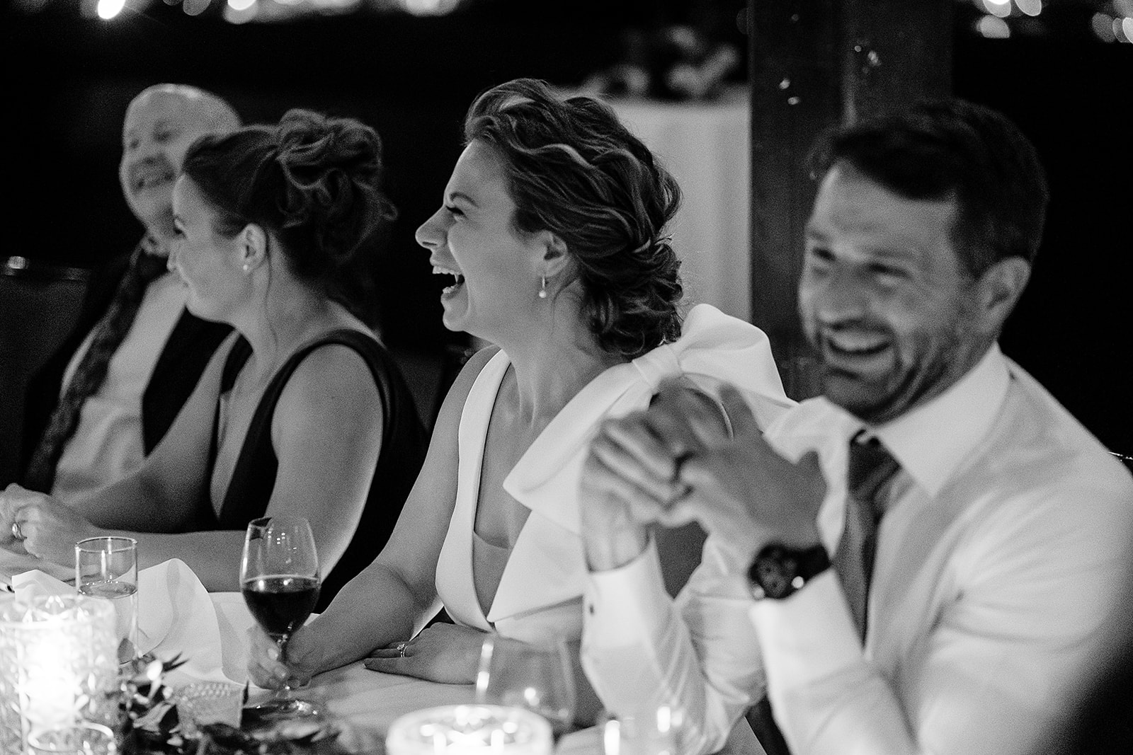 bride and groom laugh during at Olympic Rooftop Pavilion Wedding 