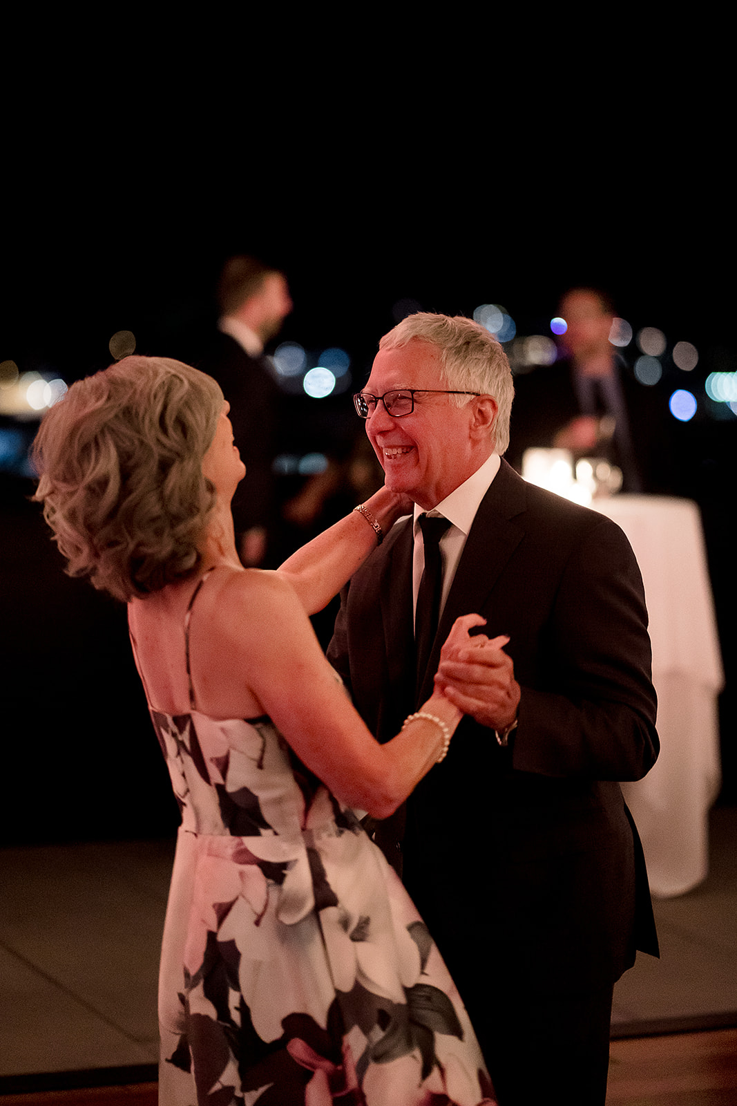 parents dance at Olympic Rooftop Pavilion Wedding 