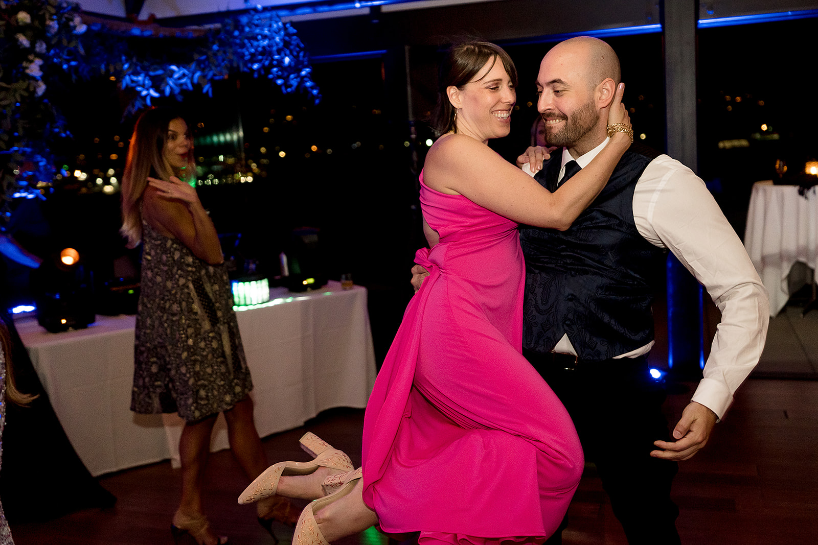 wedding guests spin at at Olympic Rooftop Pavilion Wedding 