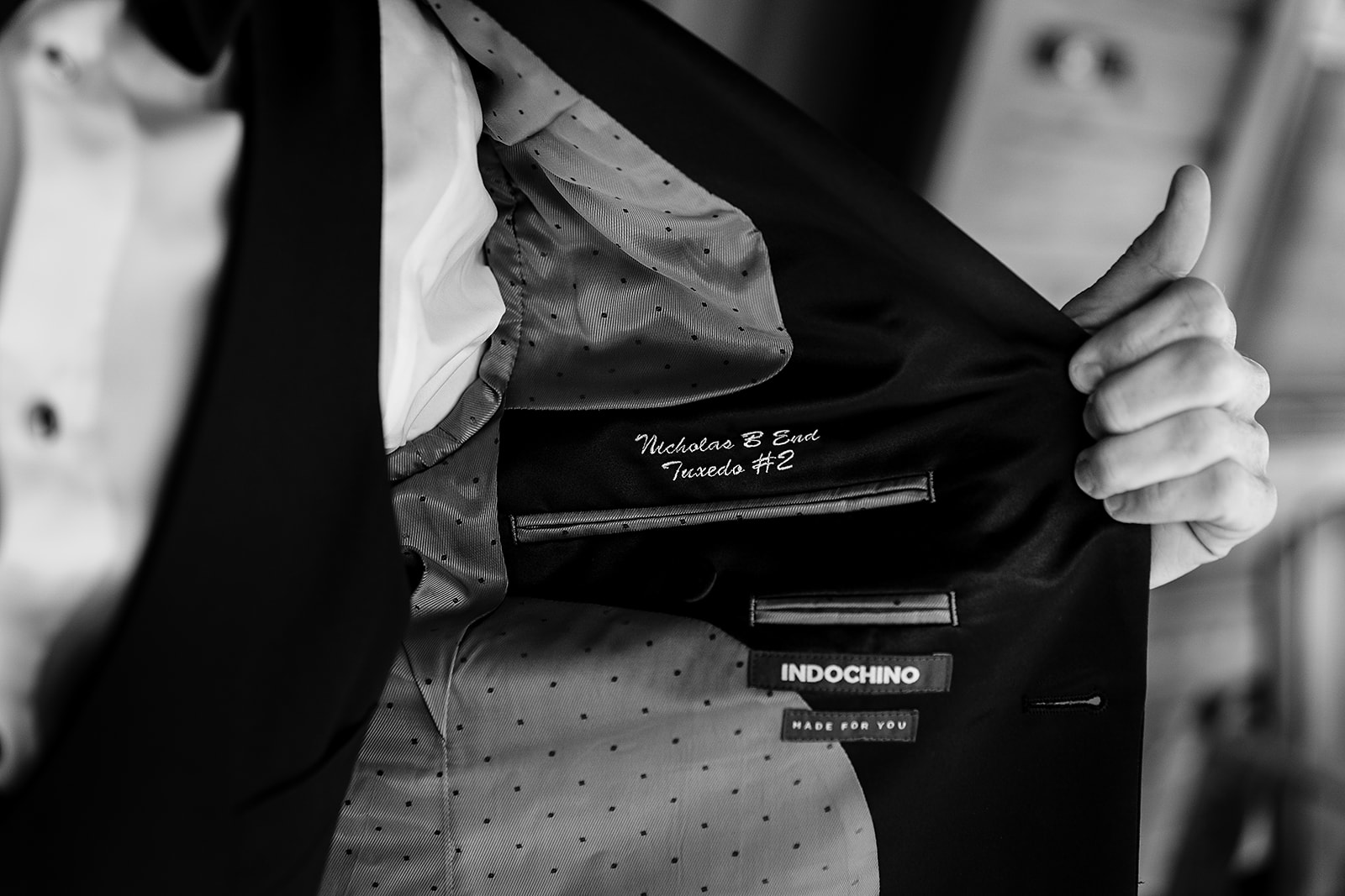 grooms shows custom embroidery inside grooms tuxedo 