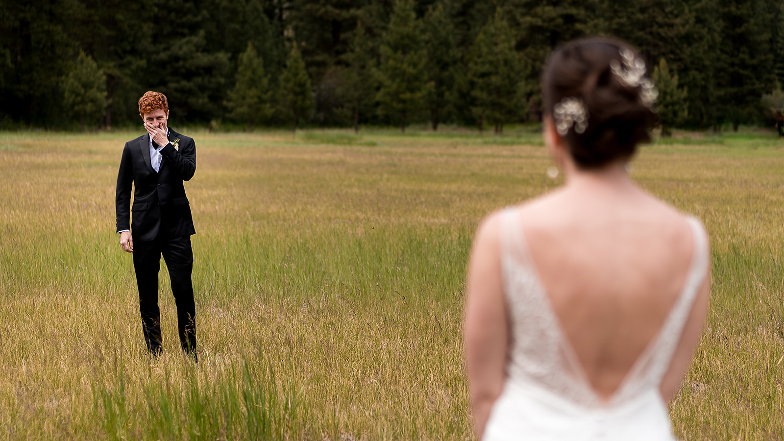 groom cries during first look at Mazama Ranch House Wedding