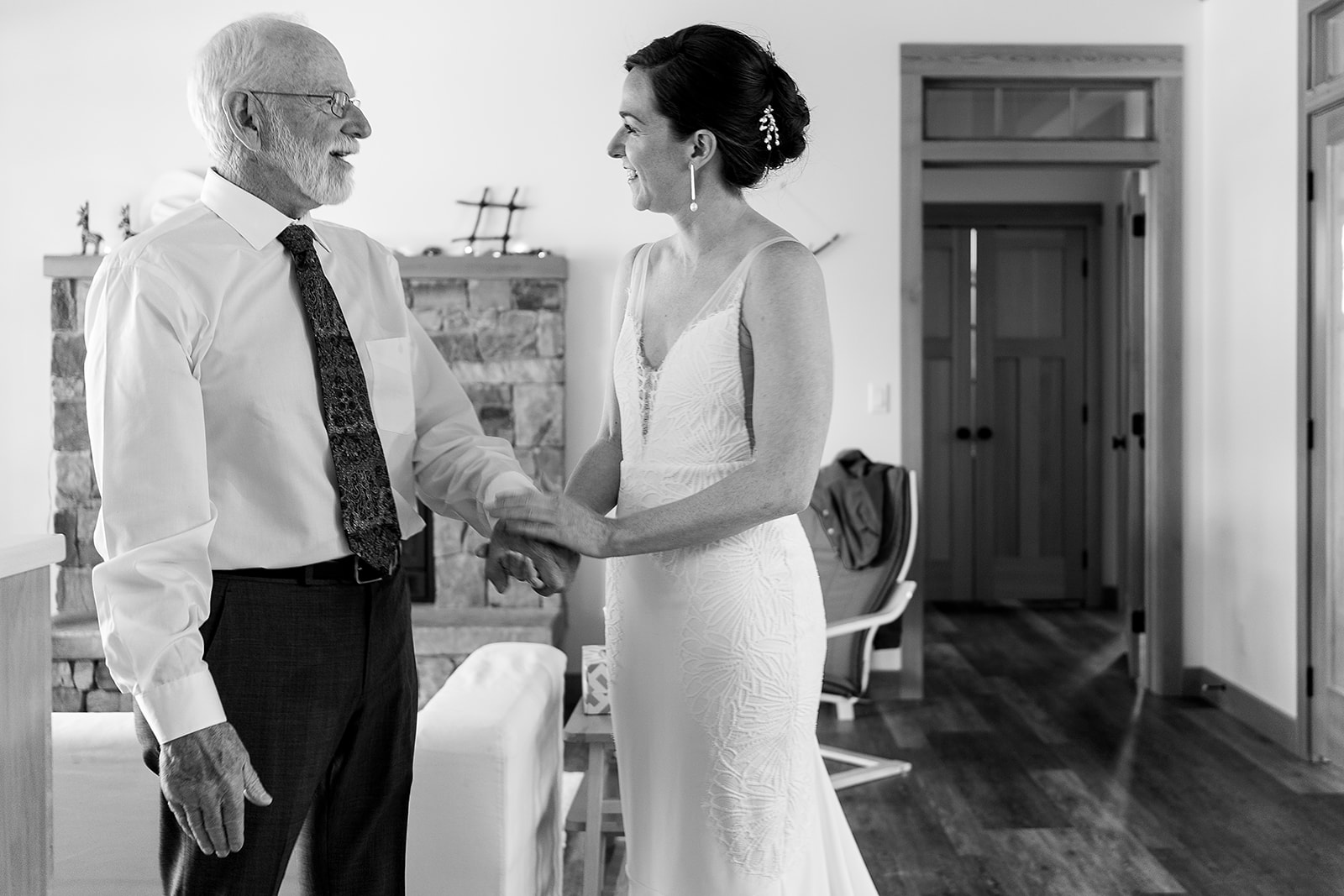 bride gets ready for wedding ceremony with father at Mazama Ranch House Wedding