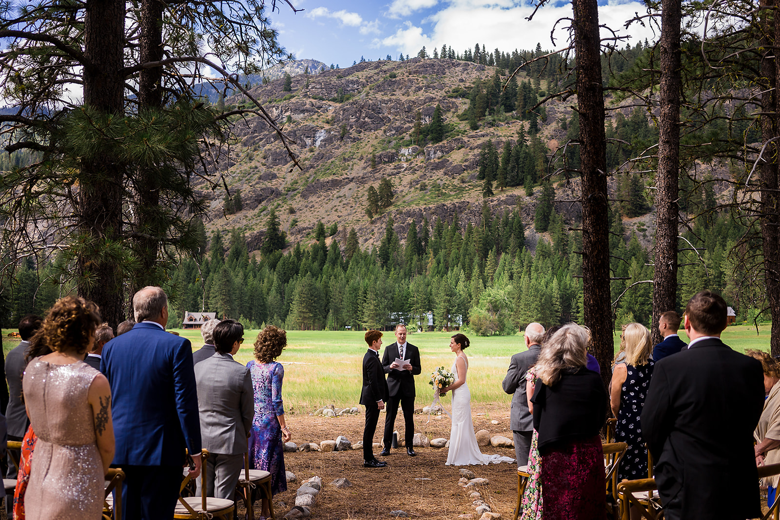 Mazama Ranch House Wedding ceremony location with mountains as the backdrop