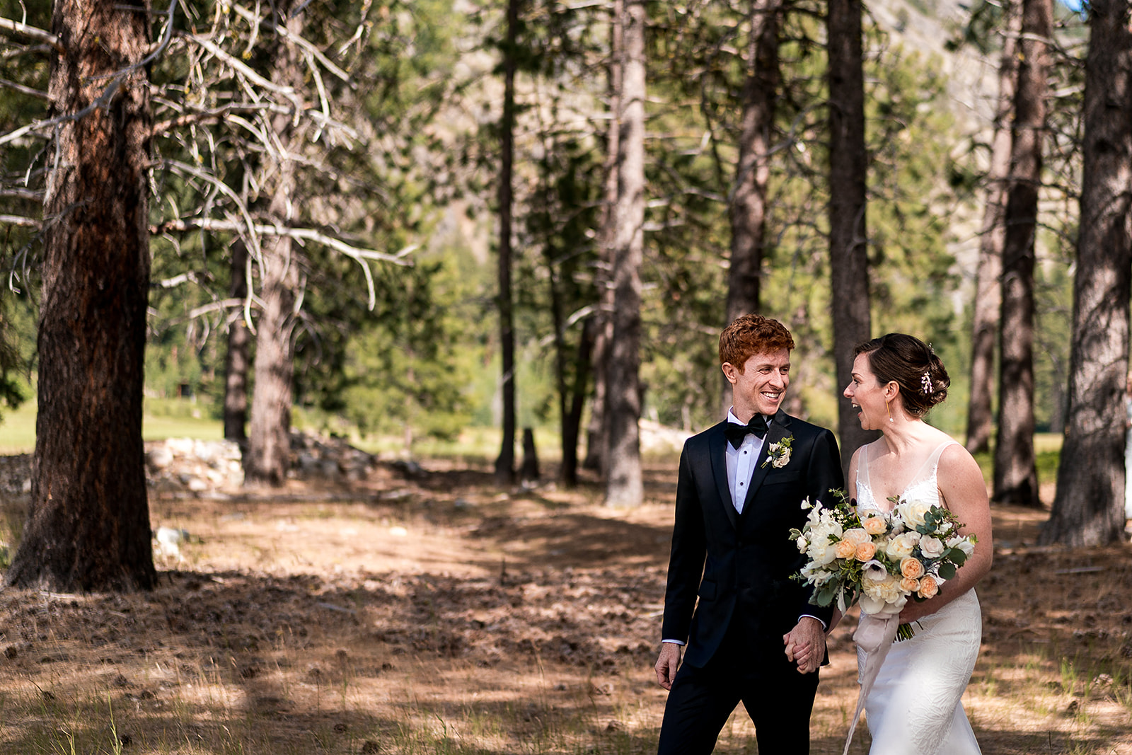 bride and groom smile together after Mazama Ranch House Wedding ceremony