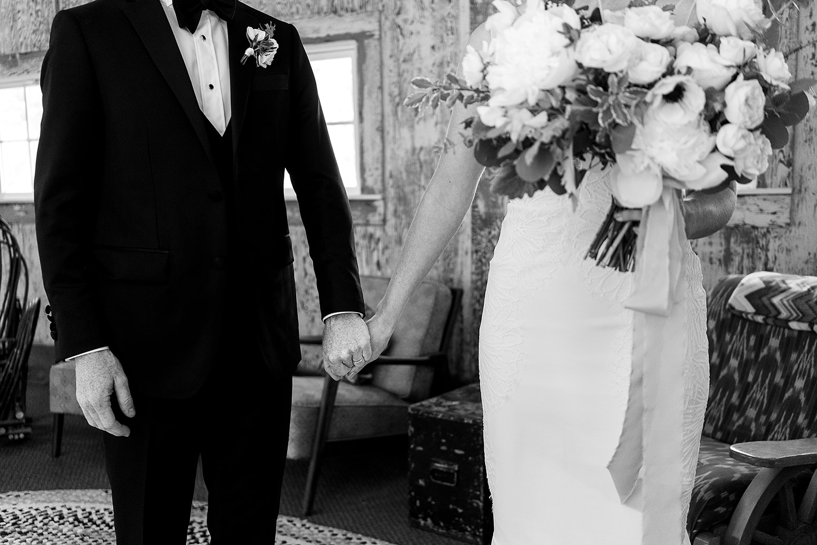 bride and groom hold hands after Mazama Ranch House Wedding ceremony