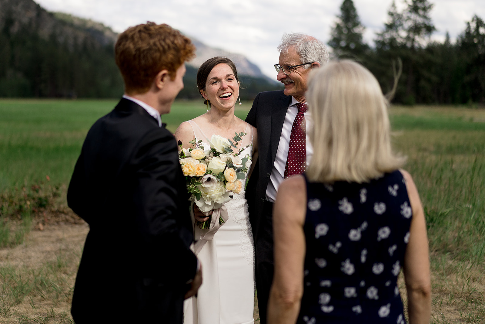 guests celebrate with bride and groom during cocktail hour at Mazama Ranch House wedding