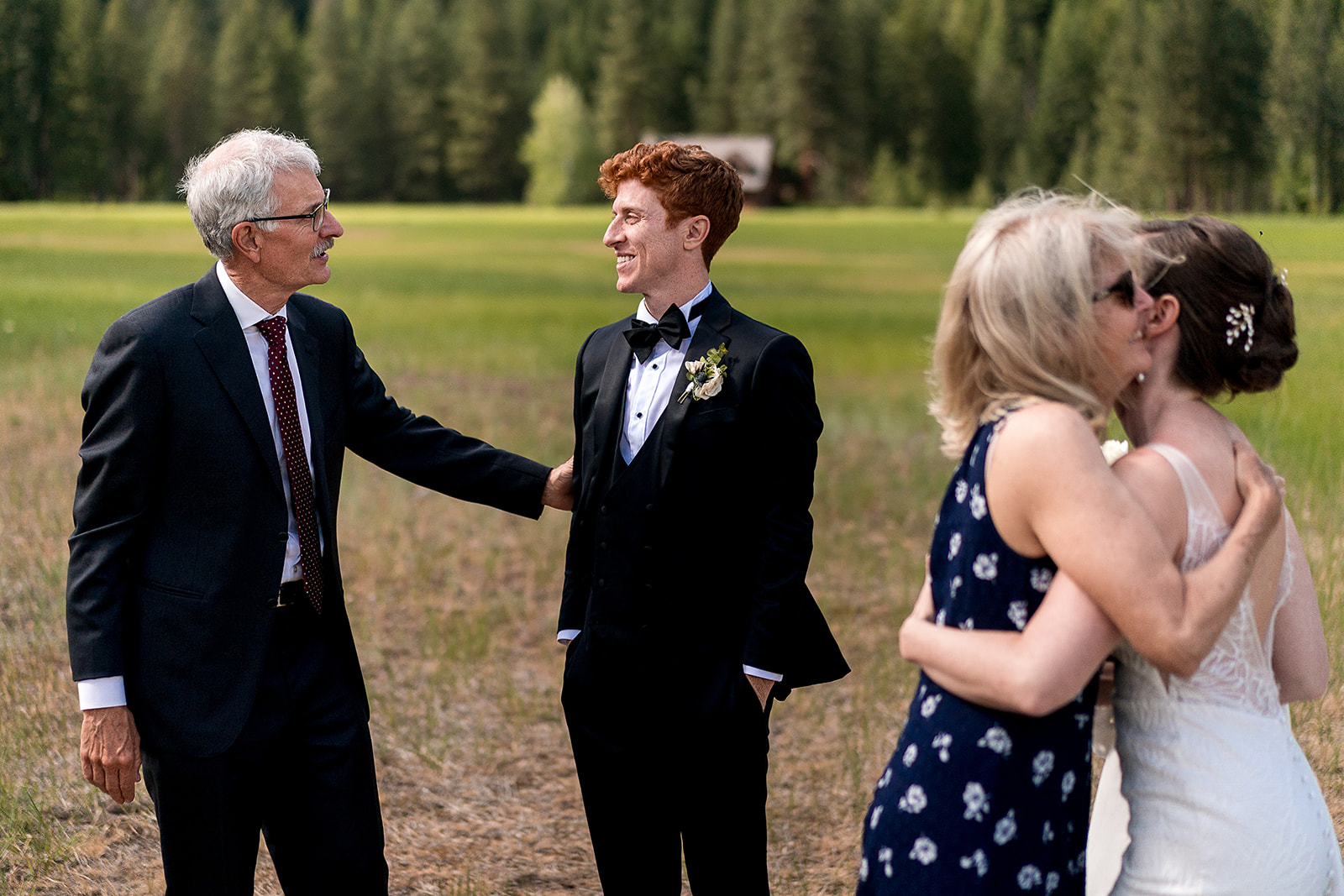 guests celebrate with bride and groom during cocktail hour at Mazama Ranch House wedding