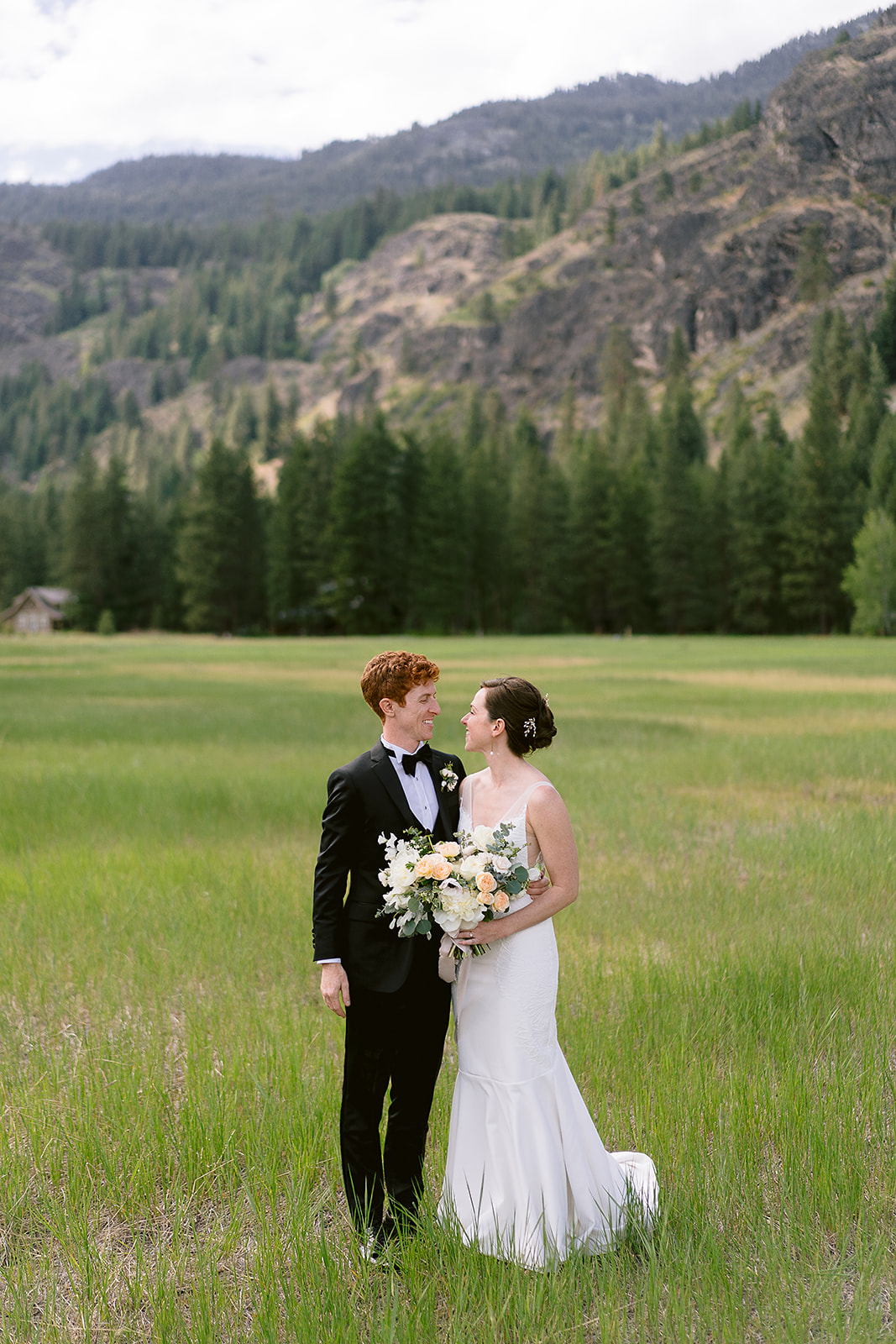 bride and groom grass field wedding portrait