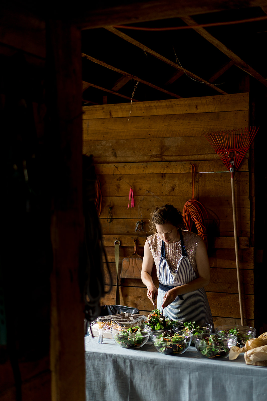 farm to table dinner is prepared in barn at Mazama Ranch House wedding