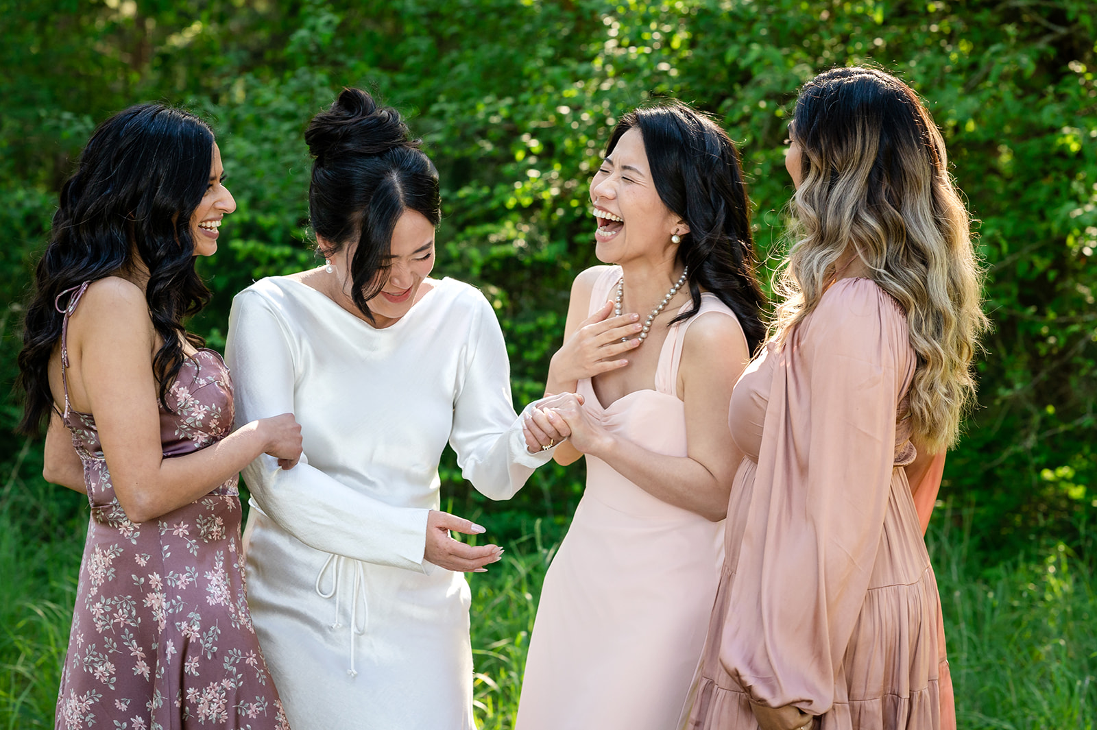 Bridesmaids laughing at Rathtrevor Beach on Vancouver Island