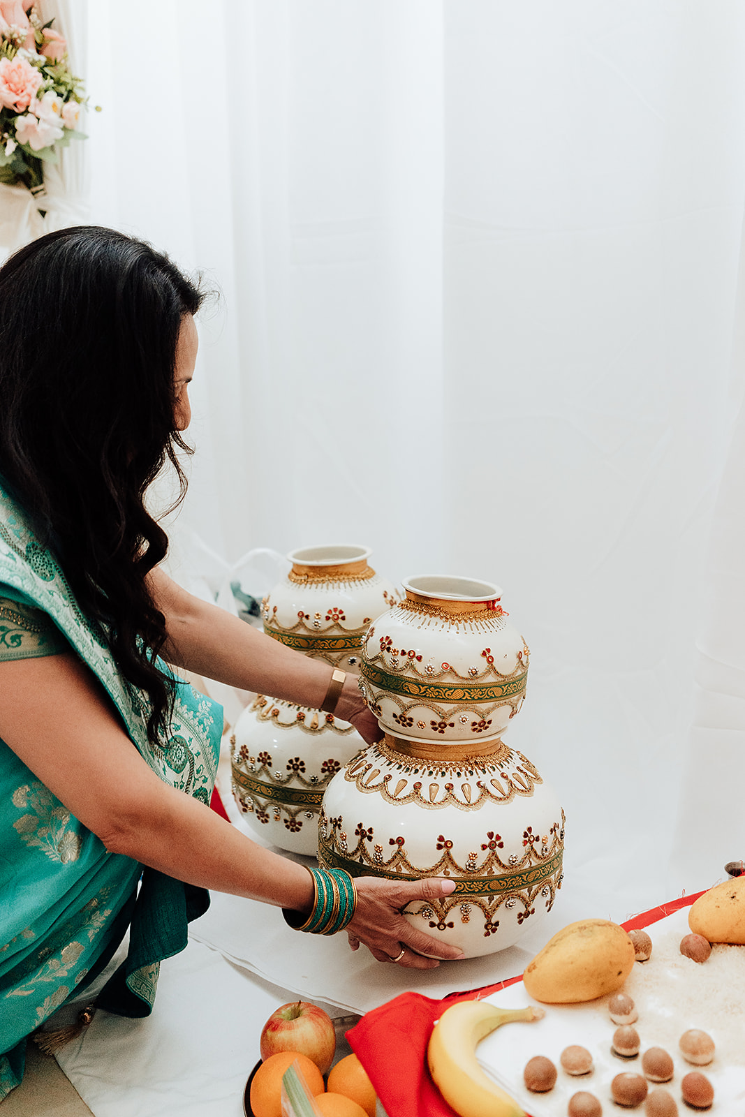 Indian wedding in Orange County California guest is perform traditional wedding rituals