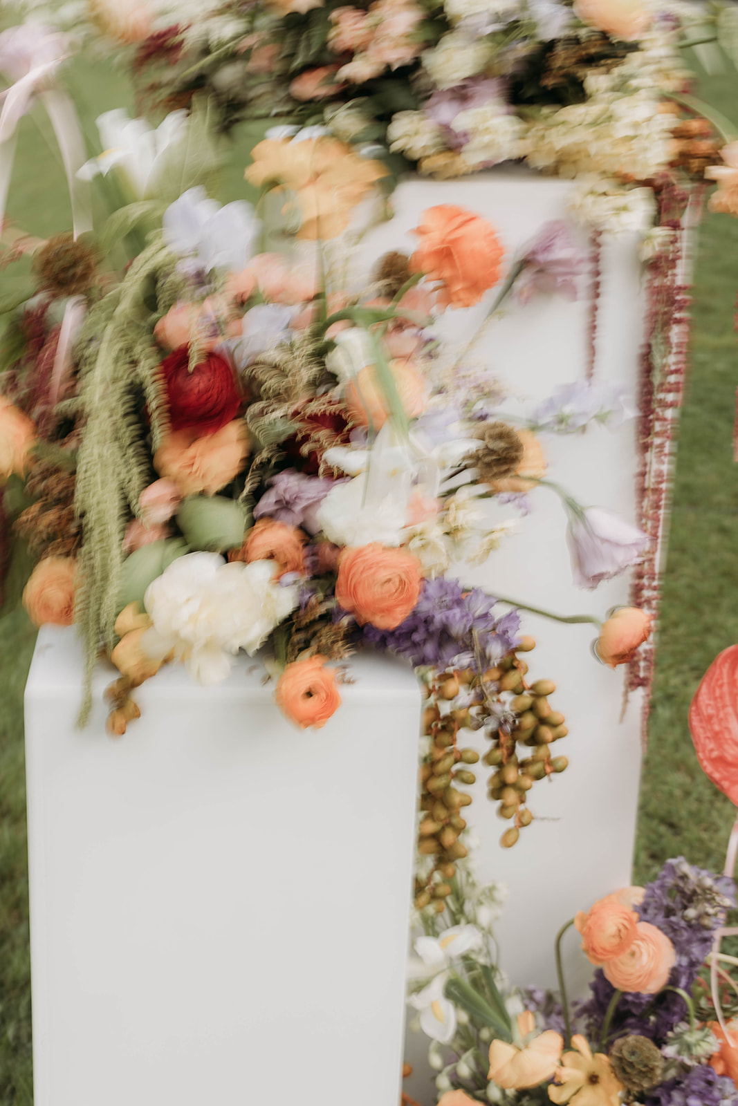 A spring festival style wedding with colorful accents and nostalgic dresses at Texas Discovery Gardens