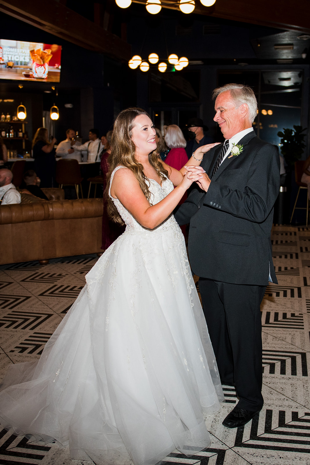 Bride shares first dance with her father.