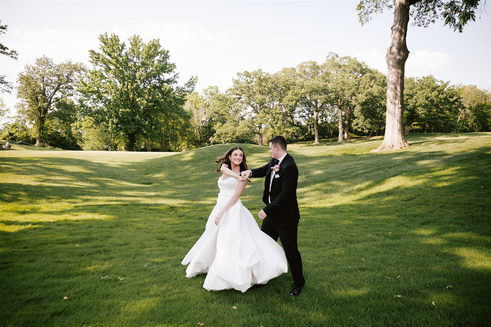 Candid portraits capturing the genuine emotions and joyful moments of the bride and groom in the warm glow of sunset.