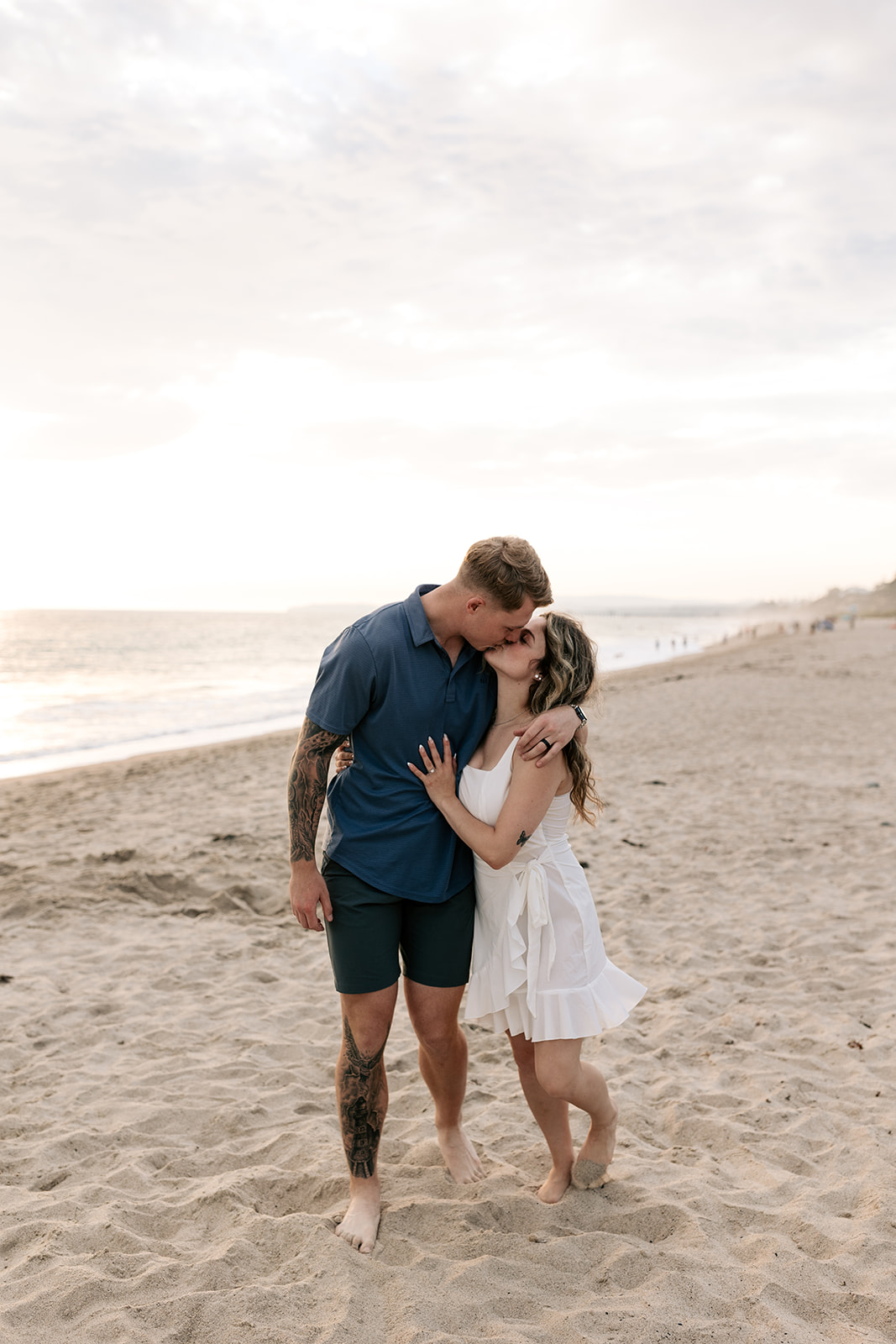 san clemente beach socal southern california engagement golden hour photos couple photography pastel skies white dress
