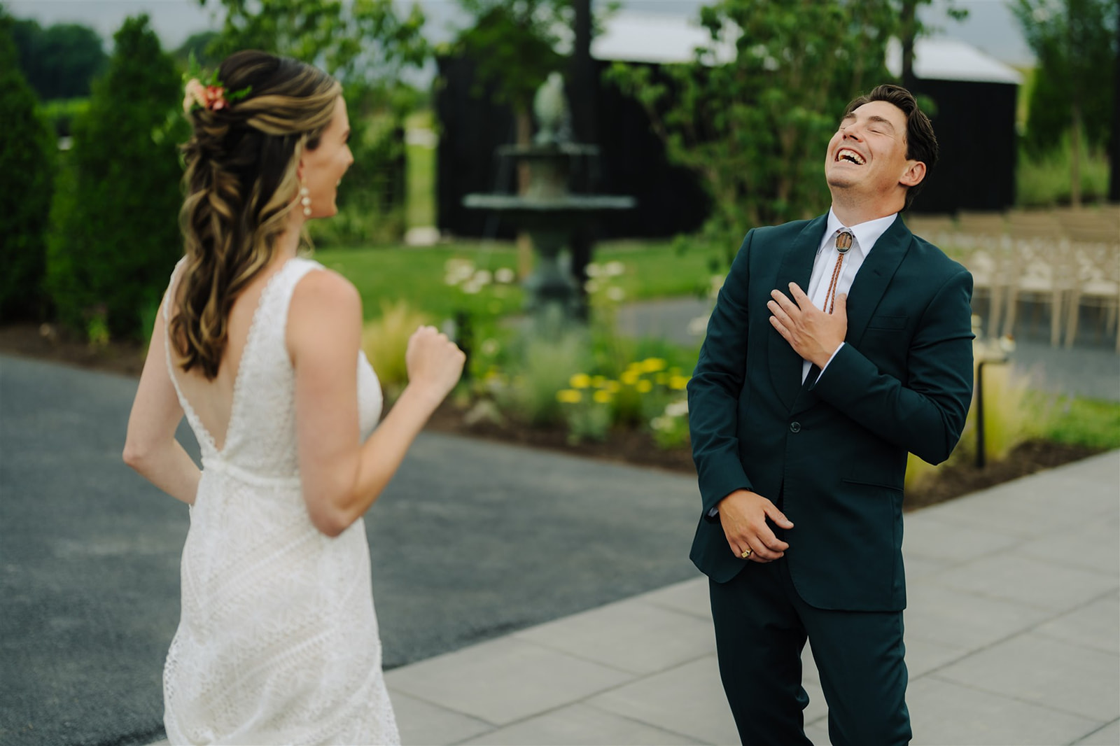 groom laughs with excitement during his first look at terrain Doylestown 