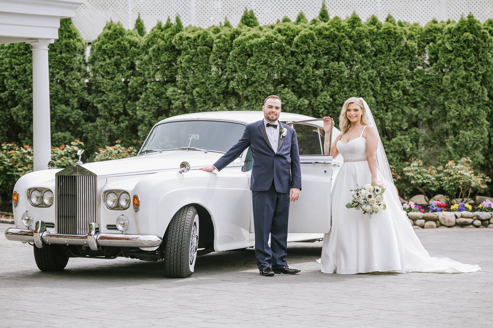 Bride and Groom with a Rolls Royce