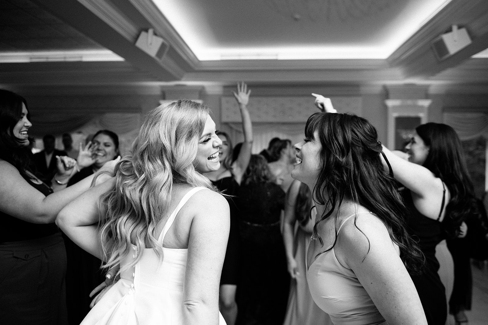 Bride and Maid of Honor Dancing