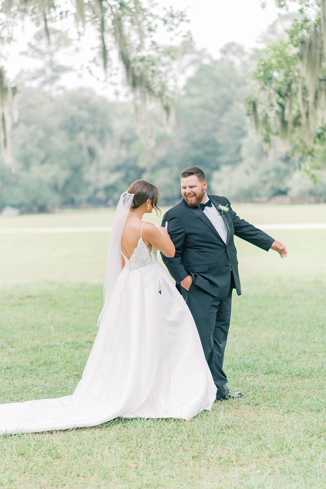 bride and groom first look at Middleton place wedding